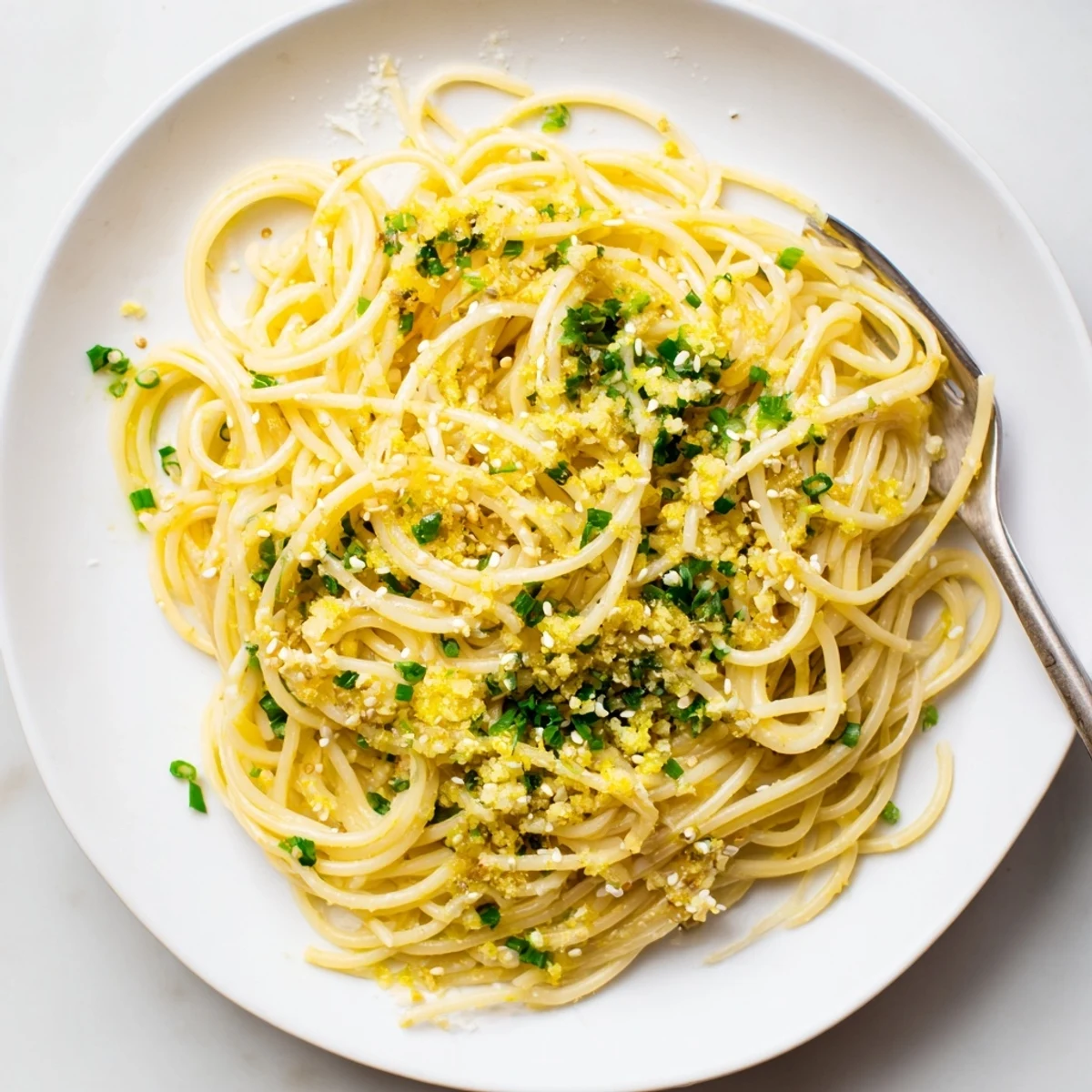 Aromatic Garlic Noodles served as a main dish with chopsticks, ready for a quick vegetarian meal.