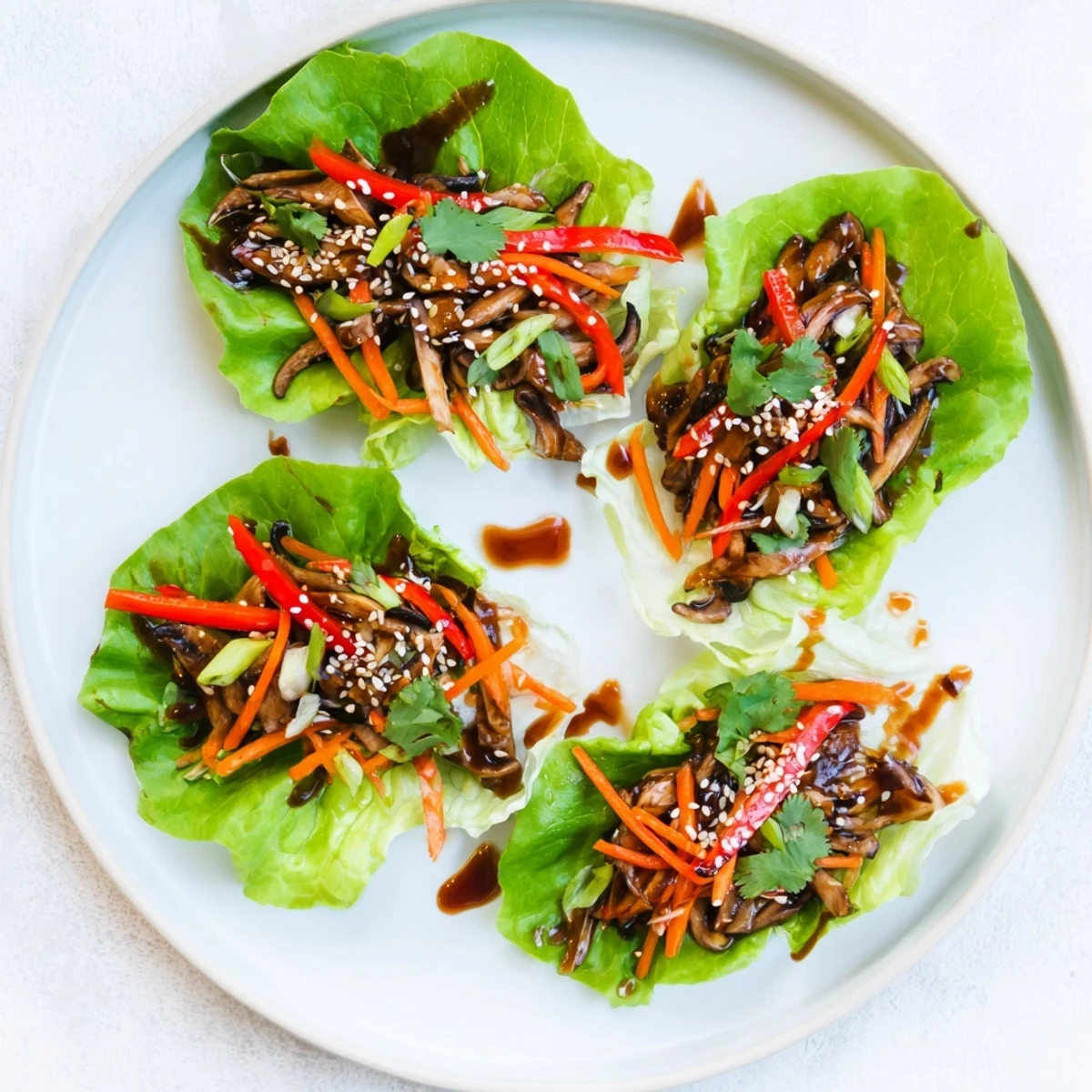 Crisp butter lettuce leaves stuffed with savory shiitake mushroom lettuce wraps.