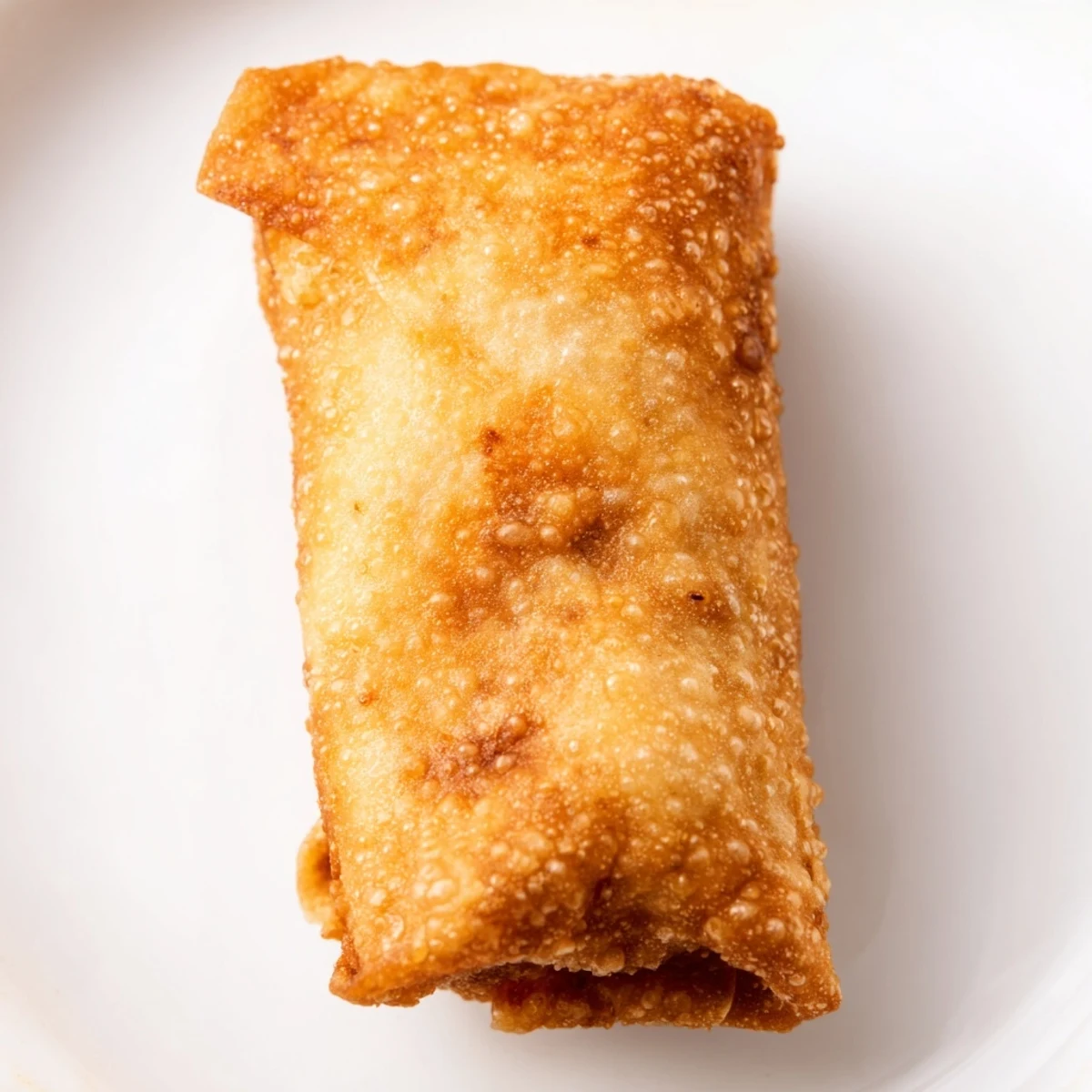 Golden crispy Southwest egg rolls filled with seasoned chicken, black beans, and melted cheese
