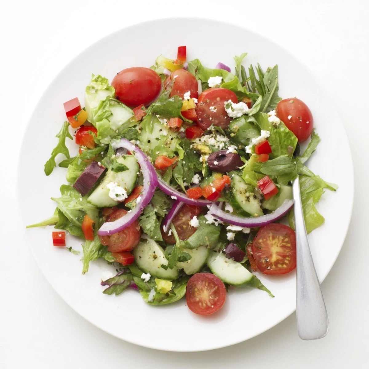 Bright Fresh Salad Recipe bursting with cherry tomatoes, crisp cucumbers, lemony dressing.