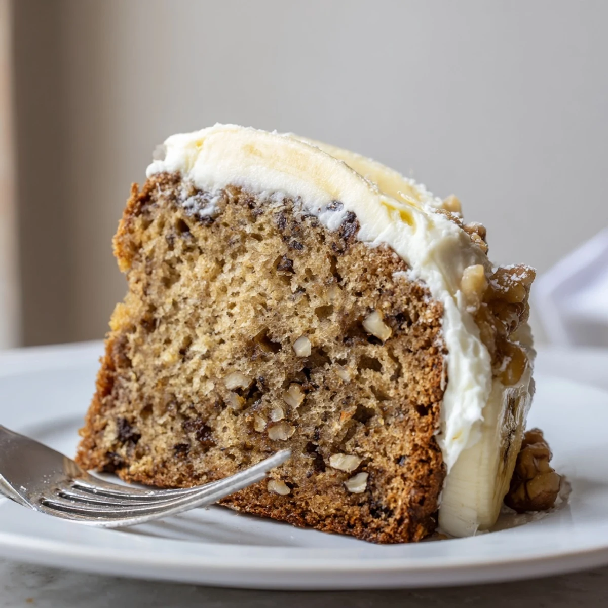 Warm Banana Bread Cake Recipe cooling on wire rack, moist golden crumb.