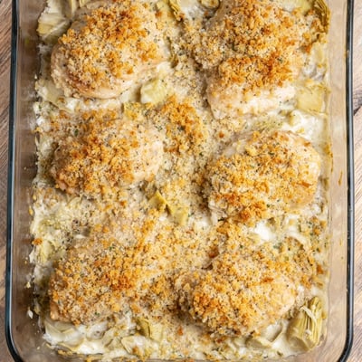 Tender chicken breasts smothered in creamy artichoke sauce with melted mozzarella topping